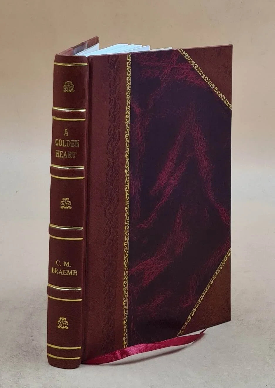 by 1889 golden [Leather Bound] Braeme. Charlotte M. A heart,